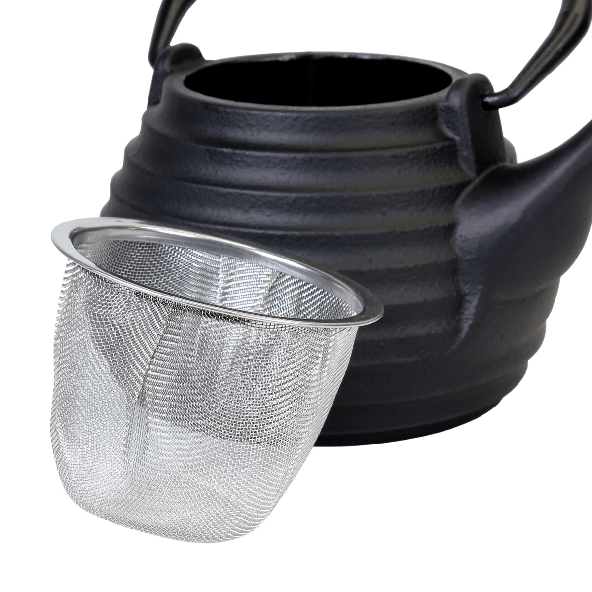Black beehive teapot with a metal mesh tea infuser made for the teapot on a white background
