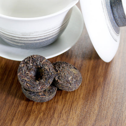 Lincang Half Dollar: 2011 Sheng Pu-Erh