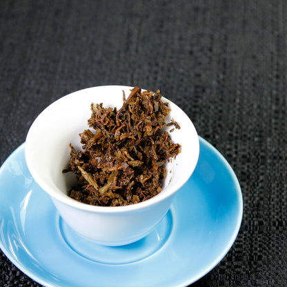 Lincang Half Dollar: 2011 Sheng Pu-Erh