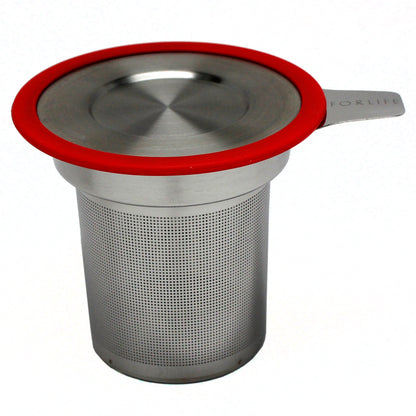 Tea infuser with red rimmed lid on a white background. 