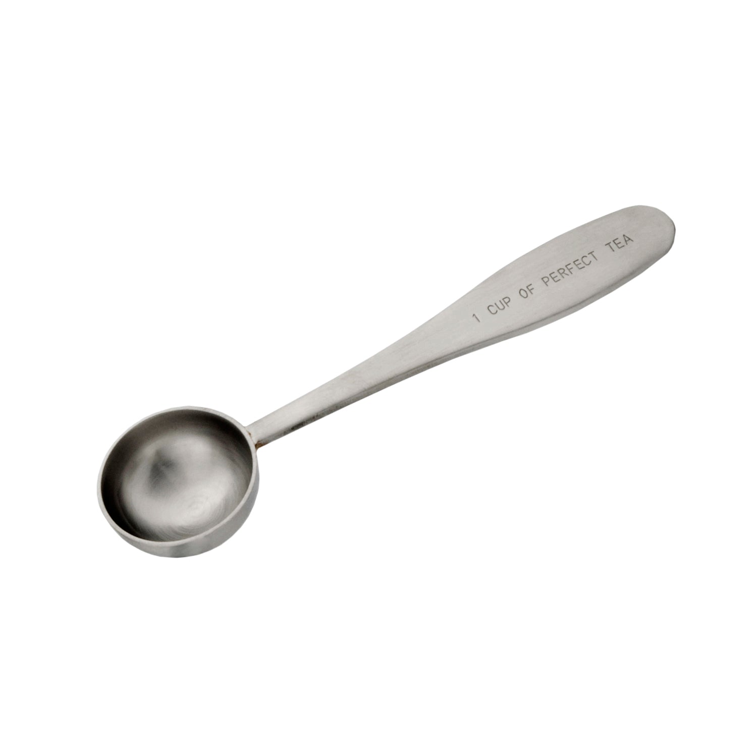 A stainless steel teaspoon with the inscription 'CUP OF PERFECT TEA' on the handle.