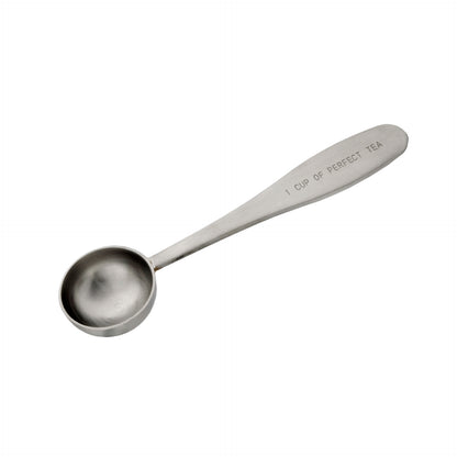 A stainless steel teaspoon with the inscription 'CUP OF PERFECT TEA' on the handle.