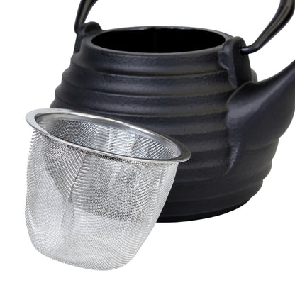Black beehive teapot with a metal mesh tea infuser made for the teapot on a white background
