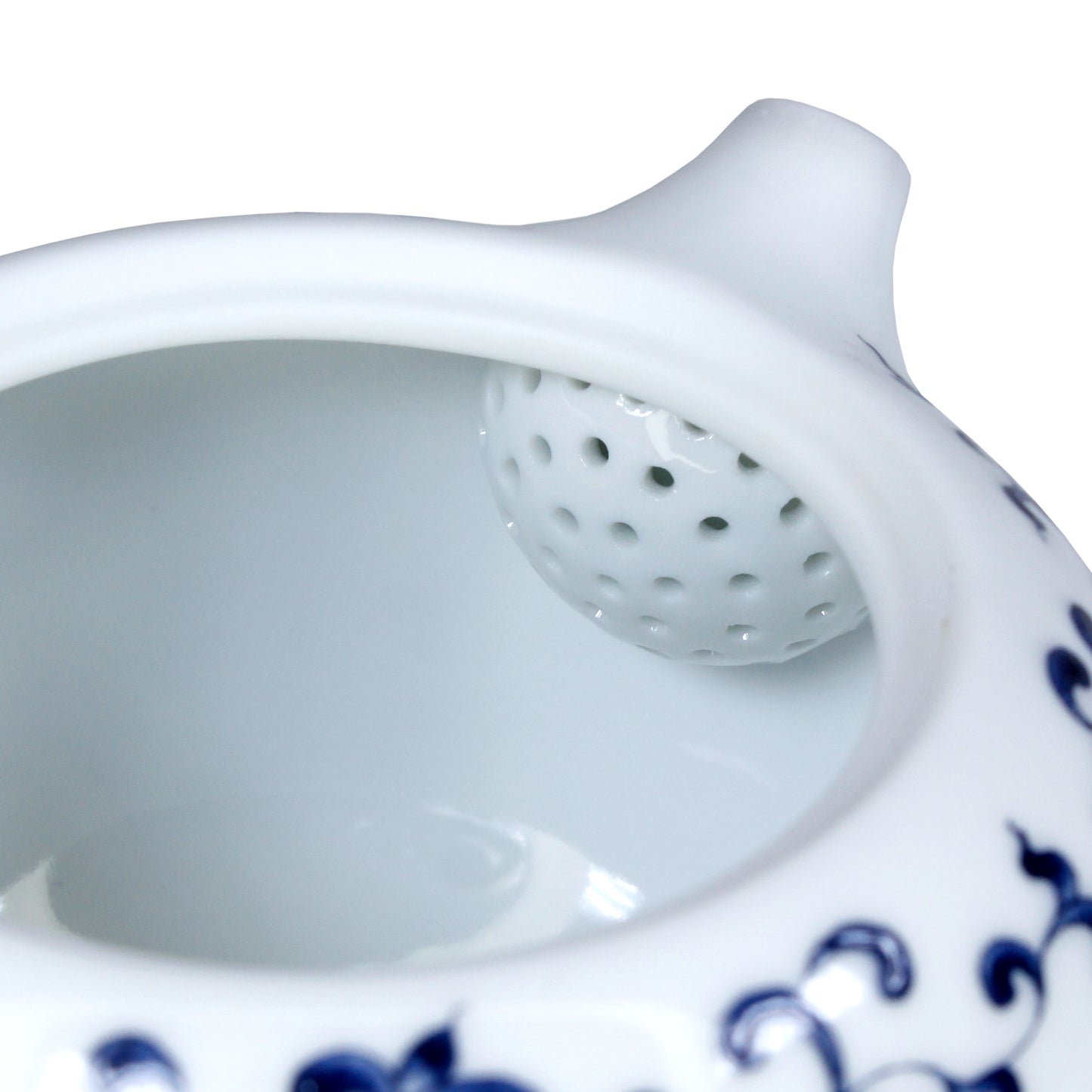 Close up to show the built in strainer at the spout. 