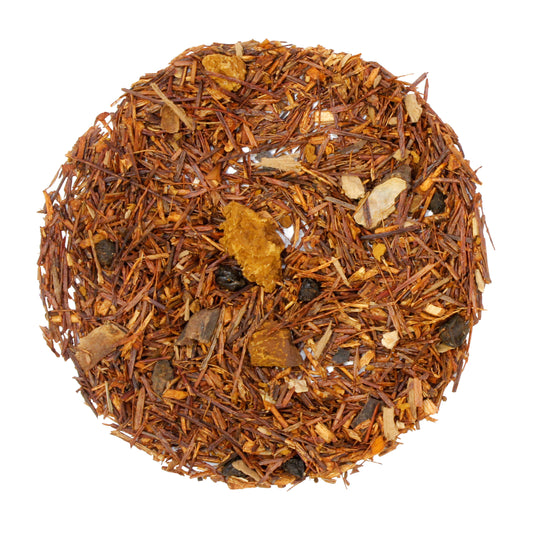 Loose pile of Boost - Tamim Teas - w Reishi & Chaga - product. Ingredients: Organic red rooibos, organic orange peel, **chaga mushroom, organic elderberries, organic roasted carob, *organic reishi mushroom, organic ginger, organic lemon peel. **sustainably harvested *US organic family farmers