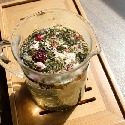 Cherry Blossom - steeping in a glass pitcher on a tea tray. Tasting Notes:
sour cherry • pineapple • jasmine