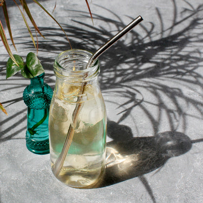 Cherry Blossom - iced in glass bottle near a few plants. Tasting Notes:
sour cherry • pineapple • jasmine