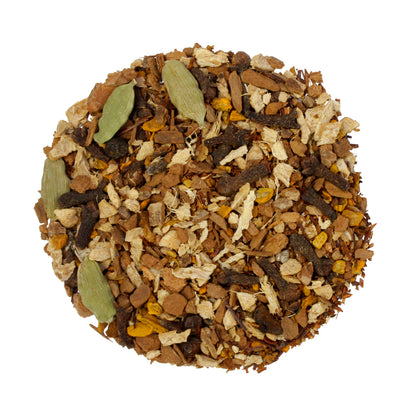 Loose pile of Herbal Chai - Tamim Teas - w Chaga & Turmeric - product on a white background. Ingredients: Organic cinnamon, organic ginger, organic red rooibos, organic cardamom, chaga mushroom*, organic clove, organic cardamom, organic peppercorn, organic turmeric.