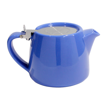 Blue ceramic teapot on a white background. 