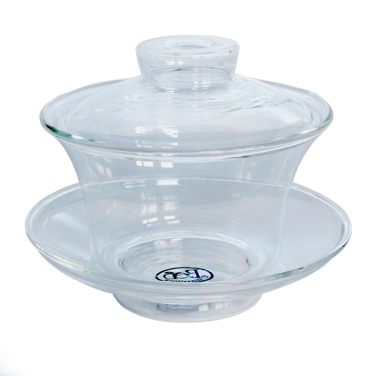 A clear glass gaiwan, which is a type of teaware commonly used for steeping tea, consisting of a bowl with a lid on top, placed on a matching saucer.